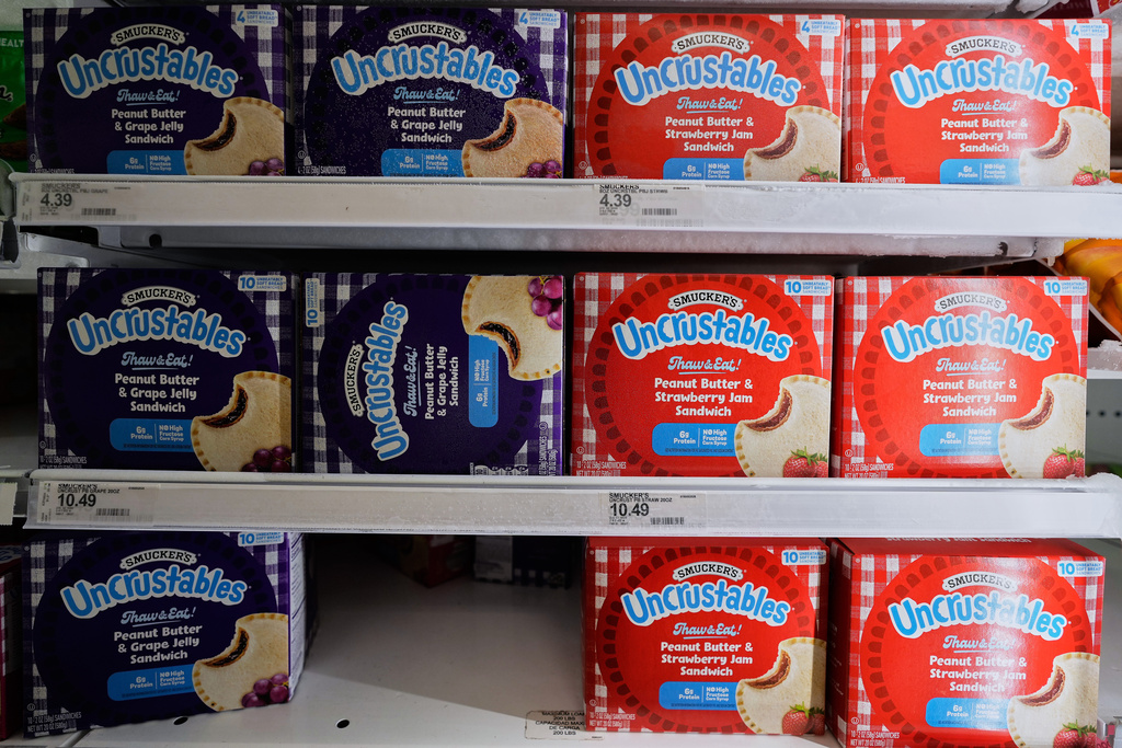 Smucker's crust-less sandwiches are displayed on shelf at a Target in Warren, Mich., Wednesday, Oct. 15, 2025. (AP Photo/Ryan Sun)