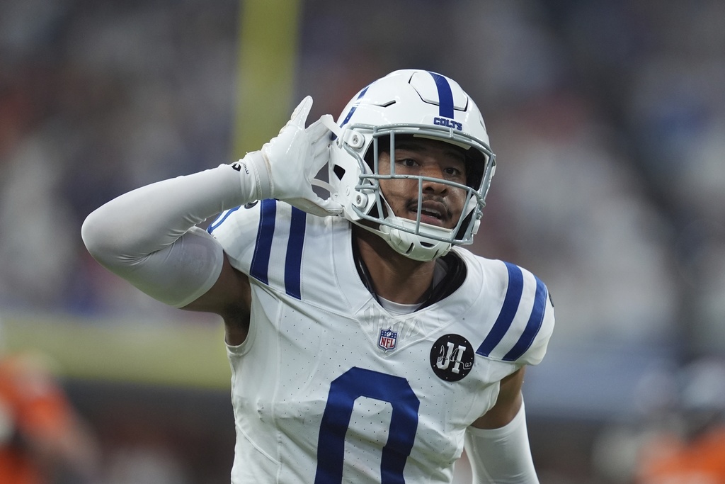 Indianapolis Colts safety Cam Bynum celebrates an interception during the second half an NFL football game against the Denver Broncos, Sunday, Sept. 14, 2025, in Indianapolis. (AP Photo/Michael Conroy)