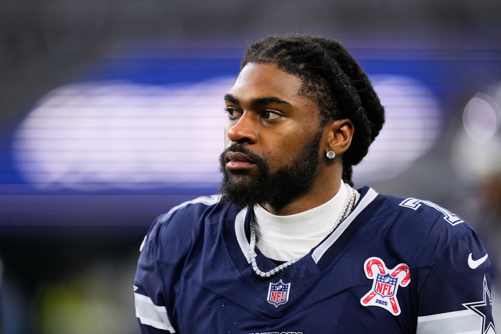 Dallas Cowboys cornerback Trevon Diggs (7) walks along he sideline during the first half of an NFL football game against the Los Angeles Chargers, Sunday, Dec. 21, 2025, in Arlington, Texas. (AP Photo/Tony Gutierrez)