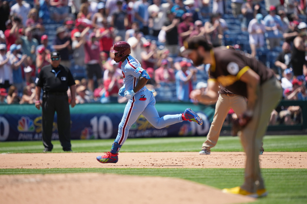 Philadelphia Phillies' Adolis García runs the basses after hitting a home run off of San Diego Padres pitcher Lucas Giolito during the fifth inning of a baseball game, Thursday, June 4, 2026, in Philadelphia. (AP Photo/Matt Rourke)
