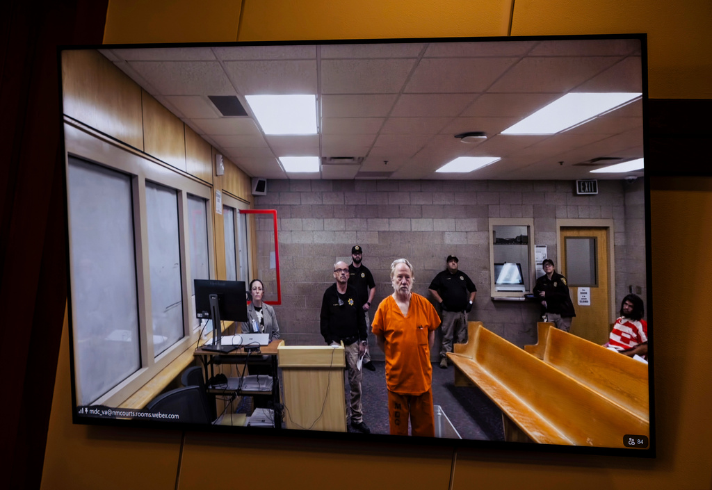 A screen displays a video link of Timothy Busfield during his court appearance from the Metropolitan Detention Center in Albuquerque, N.M., on Wednesday, Jan. 14, 2026, at the Bernalillo County Metropolitan Court. (Chancey Bush/The Albuquerque Journal via AP)