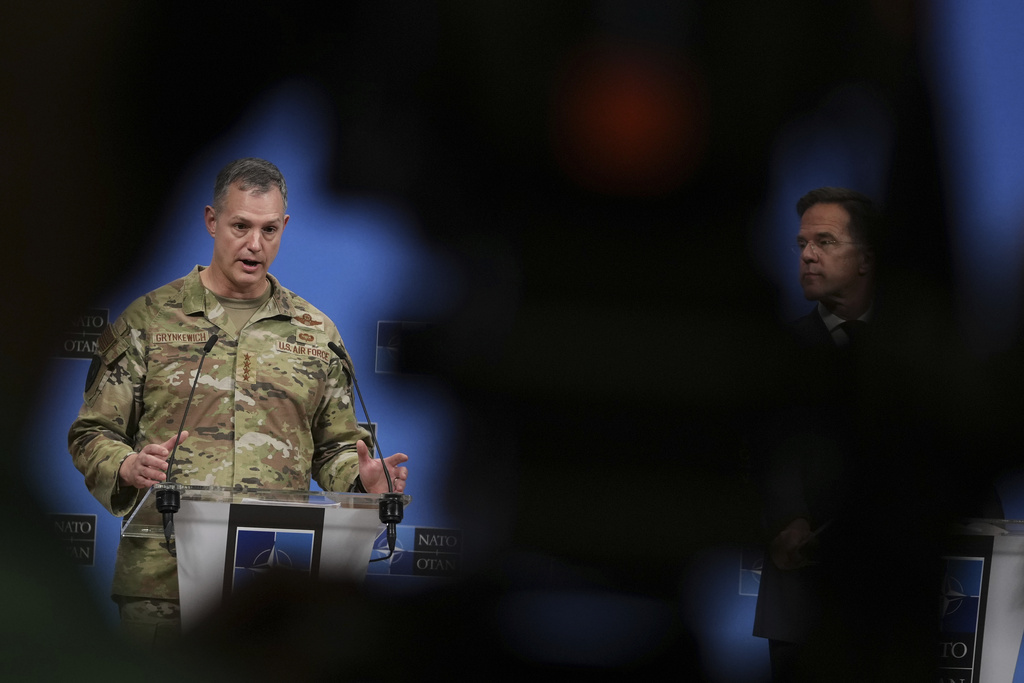 NATO Secretary General Mark Rutte, right, and Supreme Allied Commander Europe (SACEUR), General Alexus G. Grynkewich, address the media at NATO headquarters in Brussels, Friday, Sept. 12, 2025. (AP Photo/Virginia Mayo)