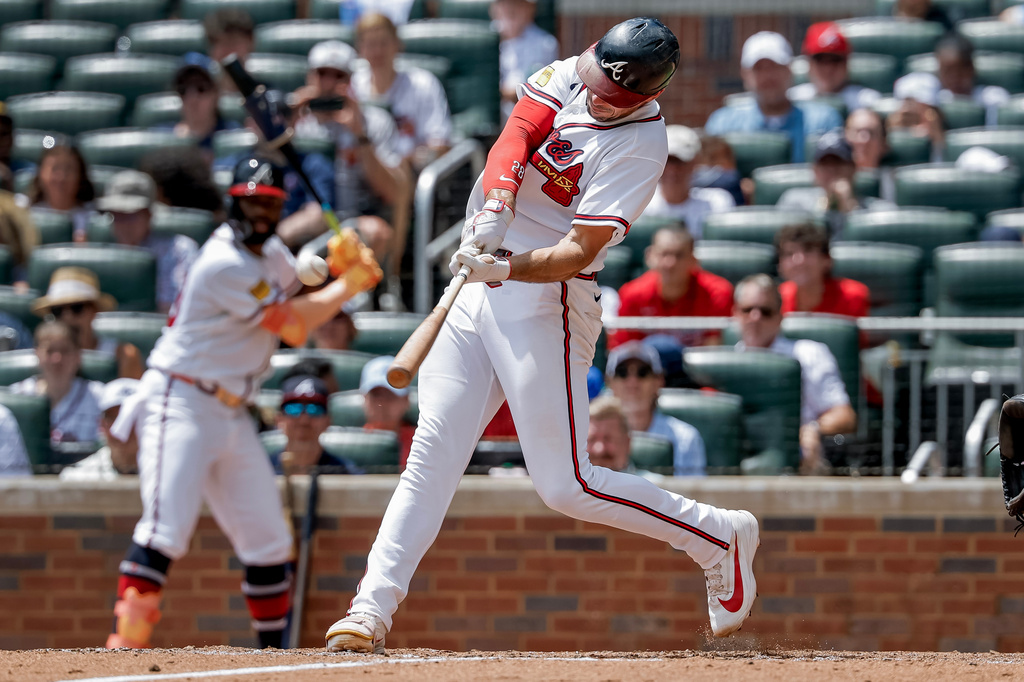 Atlanta Braves' Matt Olson hits a solo home run against the Washington Nationals during the fourth inning of a baseball game, Sunday, Aug. 2, 2026, in Atlanta. (AP Photo/Erik S. Lesser)