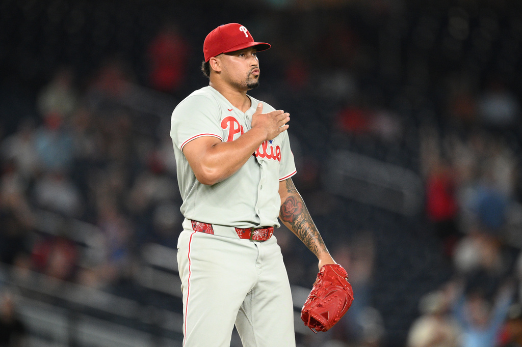 Philadelphia Phillies relief pitcher Jhoan Duran reacts at the end of a baseball game against the Washington Nationals, Wednesday, Sept. 16, 2026, in Washington. (AP Photo/Nick Wass)