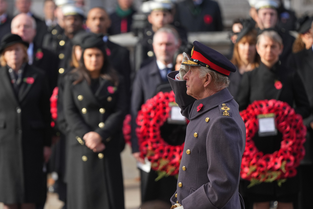 Britain's King Charles III salutes as he attends the Remembrance Sunday Service at the Cenotaph in London, Sunday, Nov. 9, 2025.(AP Photo/Alastair Grant, Pool)