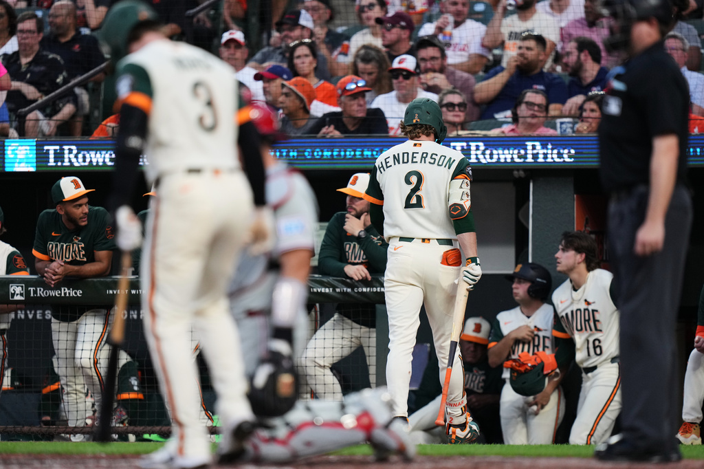 Baltimore Orioles' Gunnar Henderson (2) returns to the dugout after striking out during the third inning of a baseball game against the Philadelphia Phillies, Friday, July 31, 2026, in Baltimore. (AP Photo/Stephanie Scarbrough)