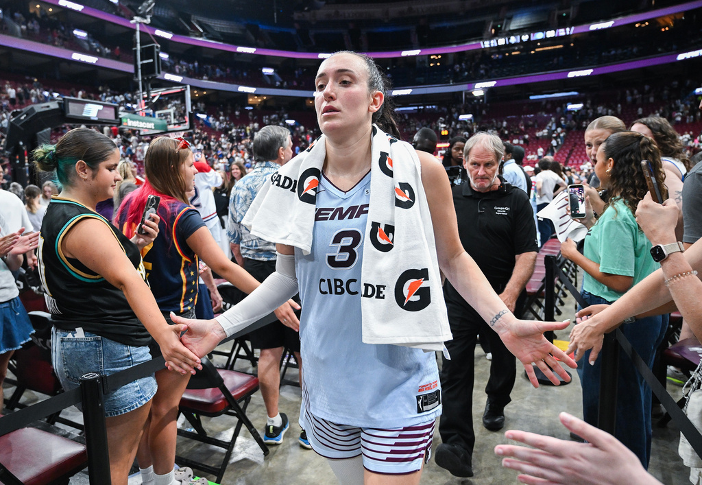 Toronto Tempo's Marina Mabrey (3) greets fans following her team's win over the New York Liberty in a WNBA basketball game in Montreal, Sunday, July 12, 2026. (Graham Hughes/The Canadian Press via AP)