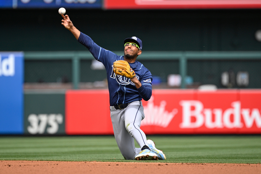 Tampa Bay Rays second baseman Richie Palacios throws out St. Louis Cardinals' Alec Burleson at first base in the first inning of a baseball game, Sunday, March 29, 2026, in St. Louis. (AP Photo/Joe Puetz)