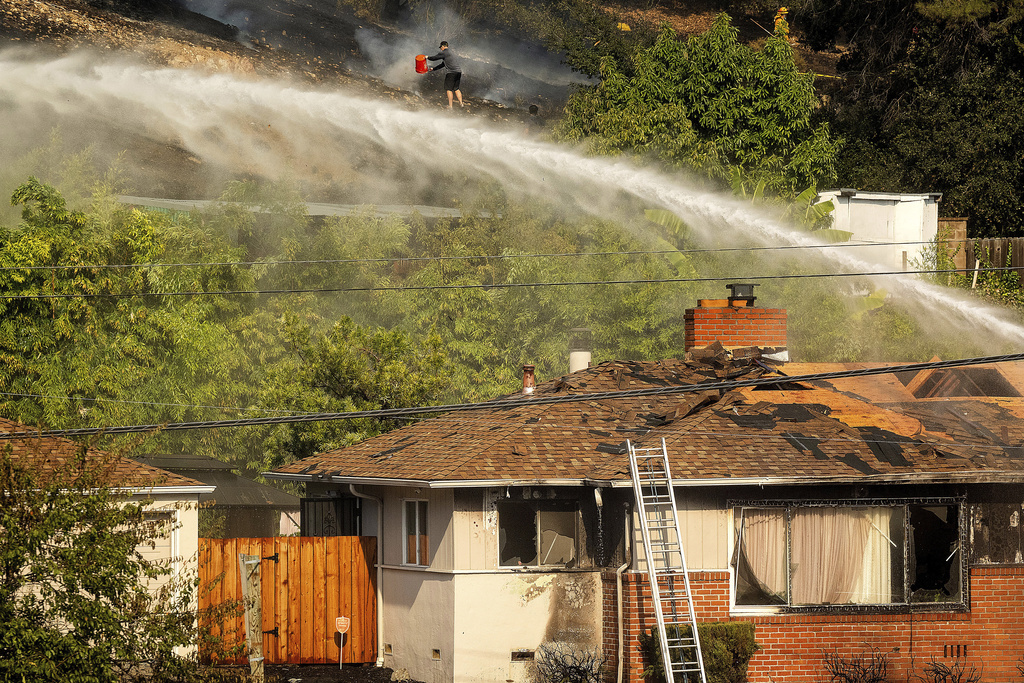 A fastmoving brush fire in California burned 2 homes while others were