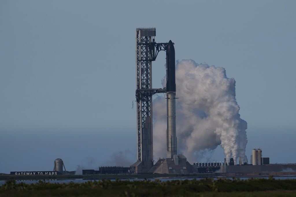 SpaceX's mega rocket Starship is prepared for a test flight that was later delayed, in Starbase, Texas, Thursday, May 21, 2026. (AP Photo/Eric Gay)