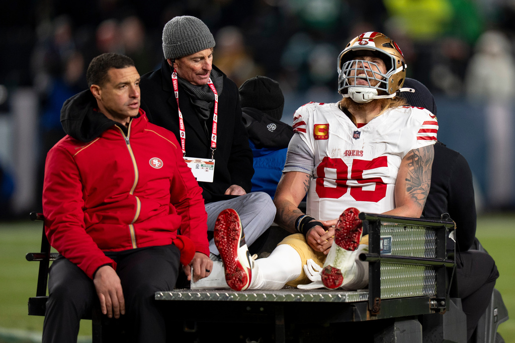 FILE - San Francisco 49ers tight end George Kittle gets carted off after being injured during an NFL wild-card playoff football game against the Philadelphia Eagles, Sunday, Jan. 11, 2026, in Philadelphia. (AP Photo/Chris Szagola, file)
