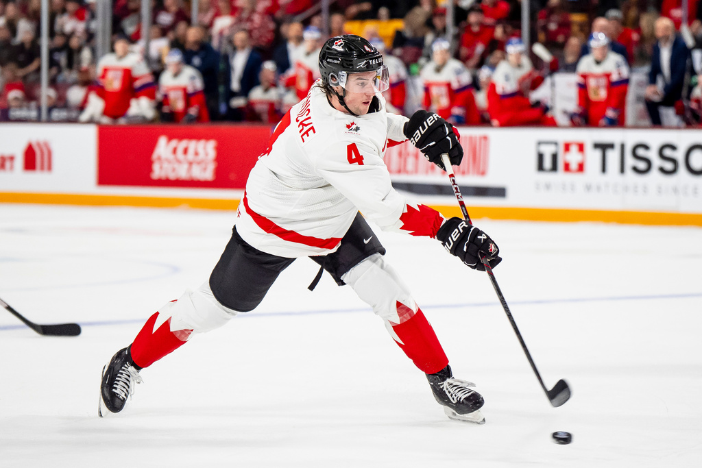 Canada's Harrison Brunicke (4) shoots against Czechia's net during second-period IIHF World Junior Championship hockey game action in Minneapolis, Friday, Dec. 26, 2025. (Christopher Katsarov/The Canadian Press via AP)