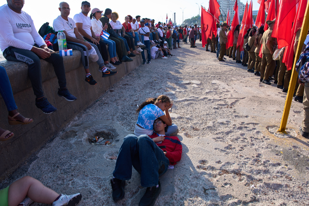 People rest after a march marking International Workers' Day at Jose Marti Anti-Imperialist Square in Havana, Cuba, Friday, May 1, 2026. (AP Photo/Ramon Espinosa)