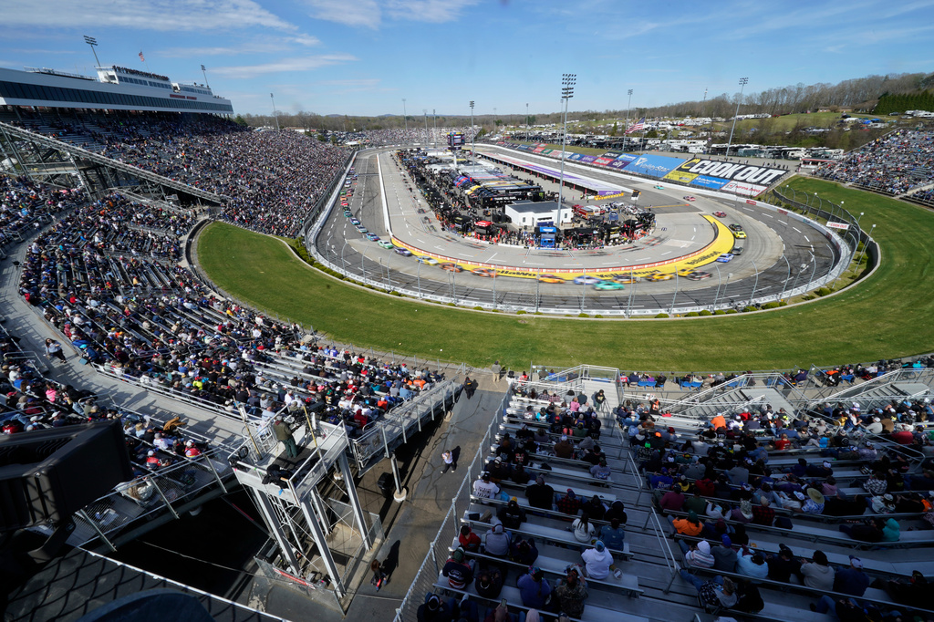 Drivers race through Turn 1 and Turn 2 during a NASCAR Cup Series auto race in Martinsville, Va., Sunday, March 29, 2026. (AP Photo/Chuck Burton)