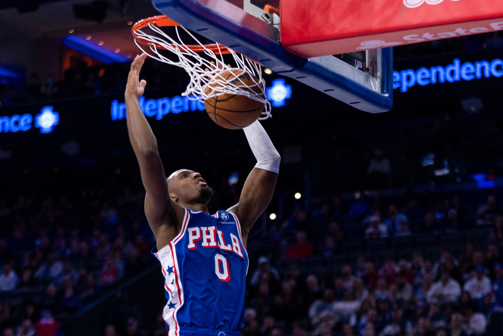 Philadelphia 76ers' Tyrese Maxey dunks during the first half of an NBA basketball game against the Indiana Pacers, Monday, Jan. 19, 2026, in Philadelphia. (AP Photo/Chris Szagola)
