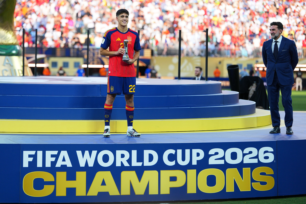 Spain defender Pau Cubarsi (22) holds the FIFA Young Player Award after the World Cup final soccer match between Spain and Argentina in East Rutherford, N.J., near New York, Sunday, July 19, 2026. (AP Photo/Julio Cortez)
