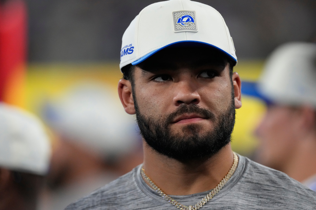 Los Angeles Rams wide receiver Puka Nacua looks on from the sidelines during the second half of an NFL preseason football game against the Los Angeles Chargers Thursday, Aug. 27, 2026, in Inglewood, Calif. (AP Photo/Mark J. Terrill)