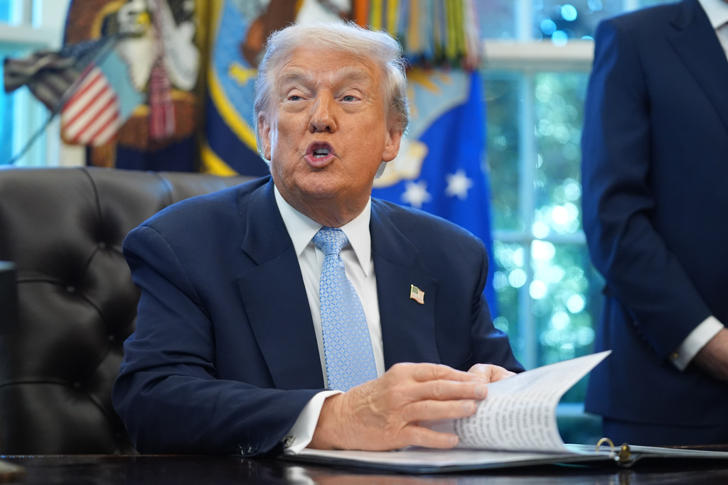 President Donald Trump speaks during a meeting with the White House task force on the 2026 FIFA World Cup in the Oval Office of the White House, Monday, Nov. 17, 2025, in Washington. (AP Photo/Evan Vucci)
