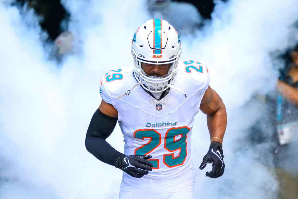 FILE - Miami Dolphins safety Minkah Fitzpatrick runs onto the field during player introductions before an NFL football game against the Buffalo Bills, Nov. 9, 2025, in Miami Gardens, Fla. (AP Photo/Doug Murray)