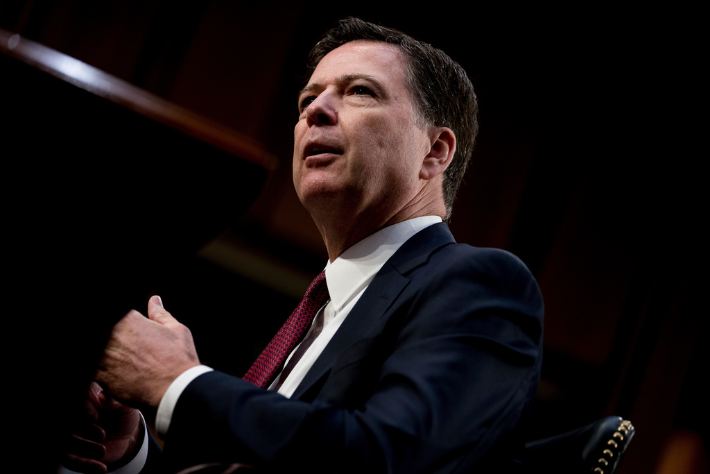 FILE - Former FBI Director James Comey speaks during a Senate Intelligence Committee hearing on Capitol Hill, June 8, 2017, in Washington. (AP Photo/Andrew Harnik, File)
