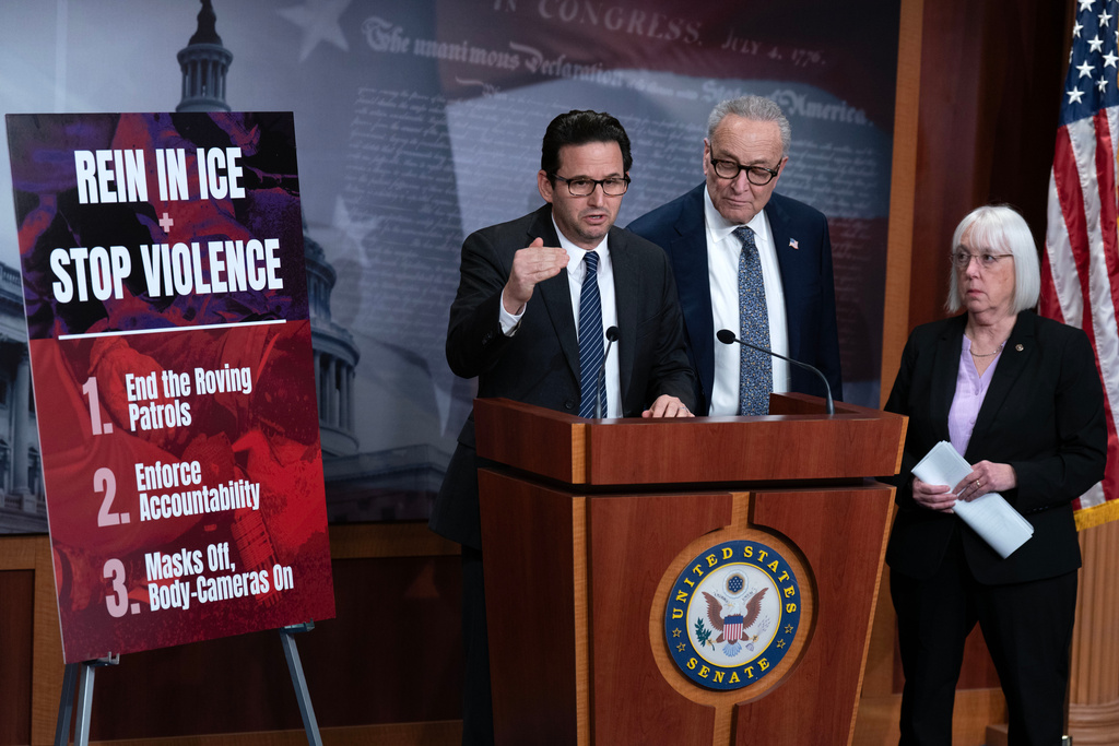 Sen. Brian Schatz, D-Hawaii, joined by Senate Minority Leader Chuck Schumer, D-N.Y. and Sen. Patty Murray, D-Wash., speaks during a news conference after senate passed a government funding deal at the Capitol in Washington, Friday, Jan. 30, 2026. (AP Photo/Jose Luis Magana)