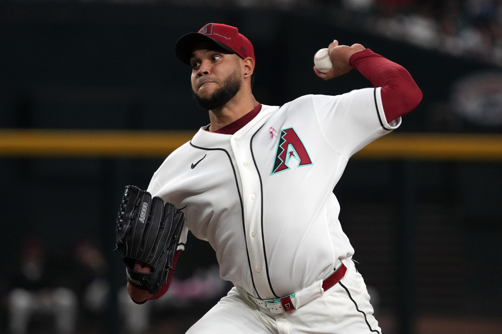 Arizona Diamondbacks pitcher Eduardo Rodriguez throws against the New York Mets in the first inning of a baseball game, Sunday, May 10, 2026, in Phoenix. (AP Photo/Rick Scuteri)