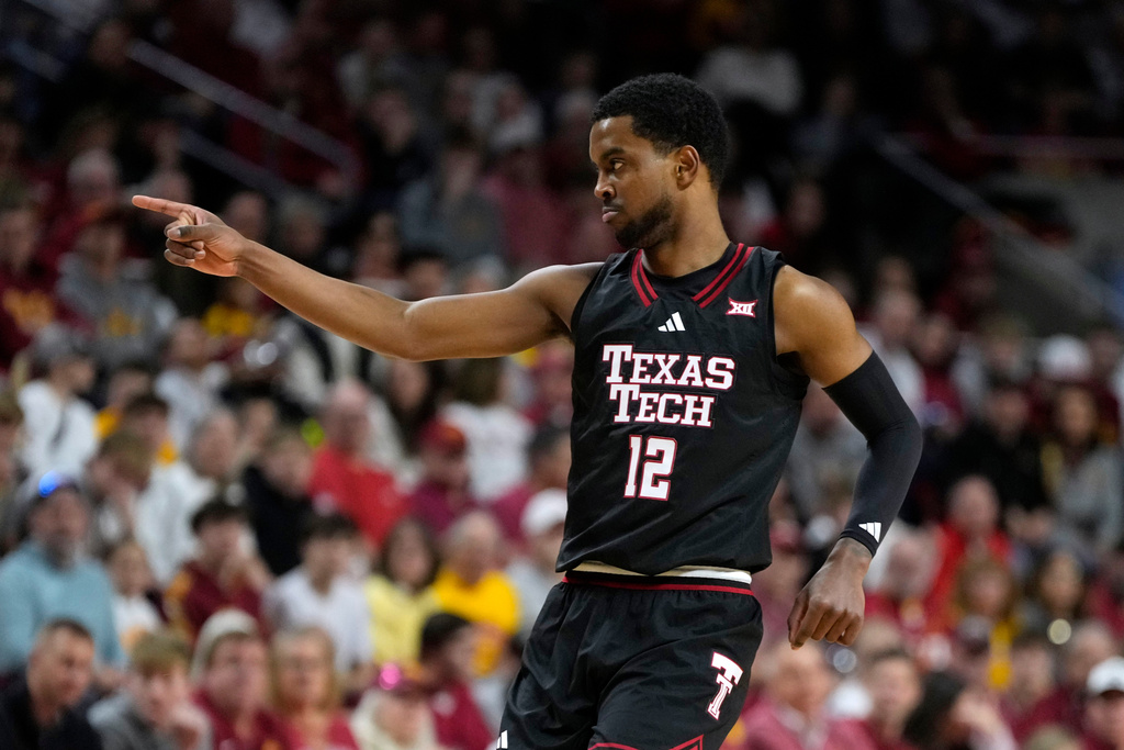 Texas Tech forward Donovan Atwell reacts after making a three-point basket during the first half of an NCAA college basketball game against Iowa State, Saturday, Feb. 28, 2026, in Ames, Iowa. (AP Photo/Charlie Neibergall)