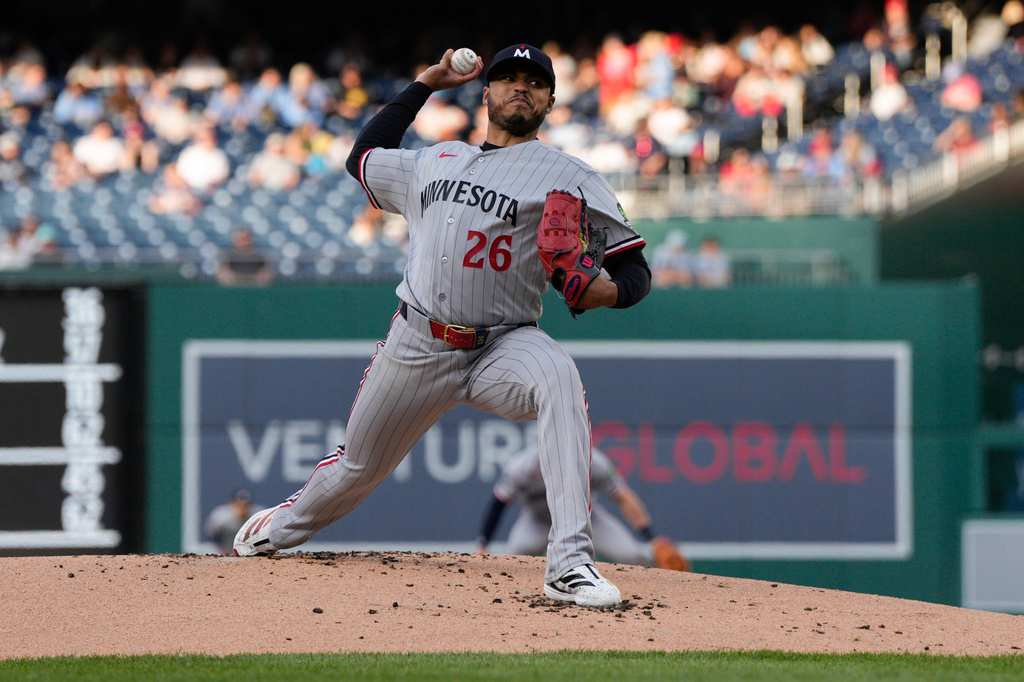 Minnesota Twins starting pitcher Taj Bradley throws to the Washington Nationals during the first inning of a baseball game, Tuesday, May 5, 2026, in Washington. (AP Photo/Jess Rapfogel)