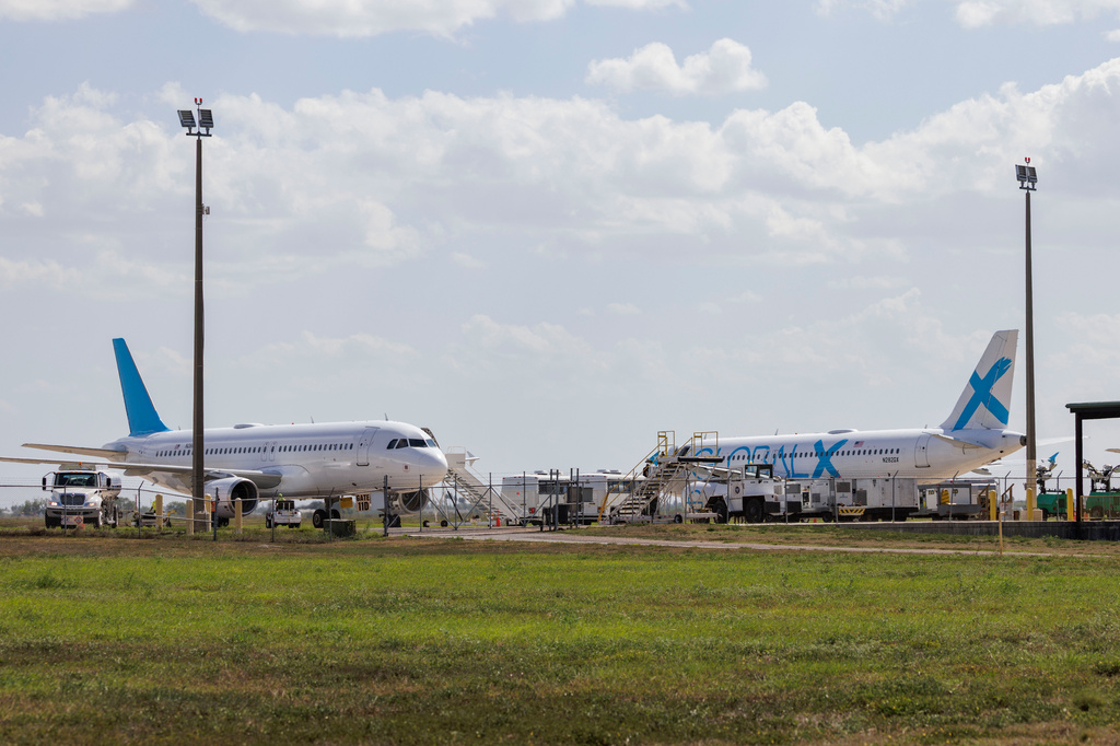 FILE - Planes used for deportation flights sit at the Valley International Airport, Aug. 31, 2025, in Harlingen, Texas. (AP Photo/Michael Gonzalez, File)