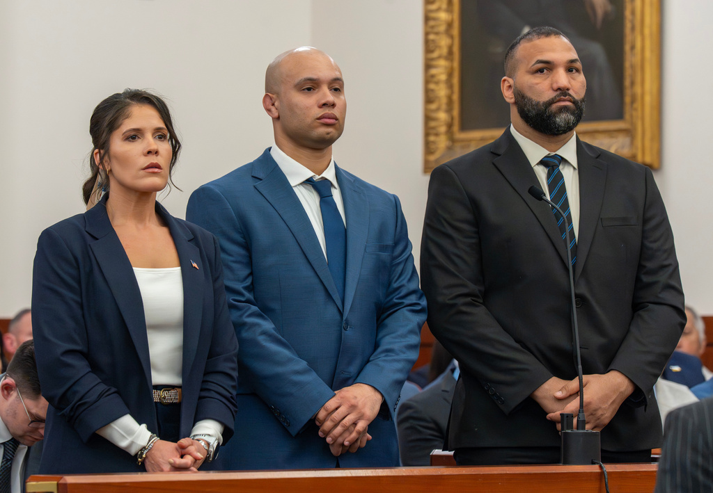 Massachusetts State Police Lt. Jennifer Penton, from left, and troopers David Montanez and Edwin Rodriguez, are arraigned on charges of involuntary manslaughter in the death of Enrique Delgado-Garcia, in Worcester Superior Court, Thursday, April 2, 2026, in Worcester, Mass. (Rick Cinclair/Worcester Telegram & Gazette via AP, Pool)