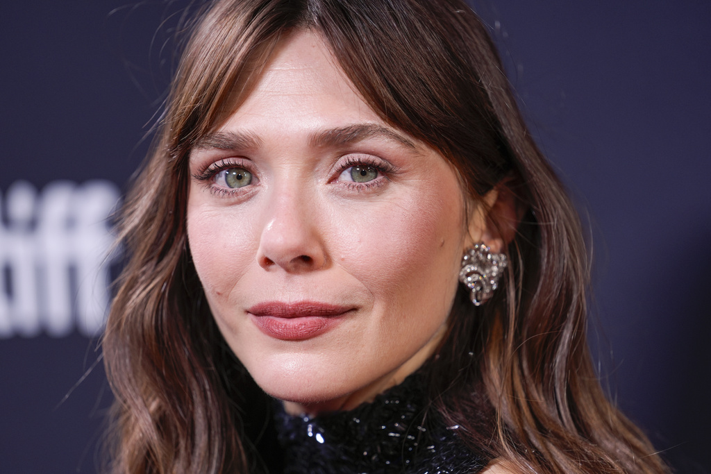 Elizabeth Olsen attends the premiere of "Eternity" during the Toronto International Film Festival on Sunday, Sept. 7, 2025, at Roy Thomson Hall in Toronto. (AP Photo/Chris Pizzello)