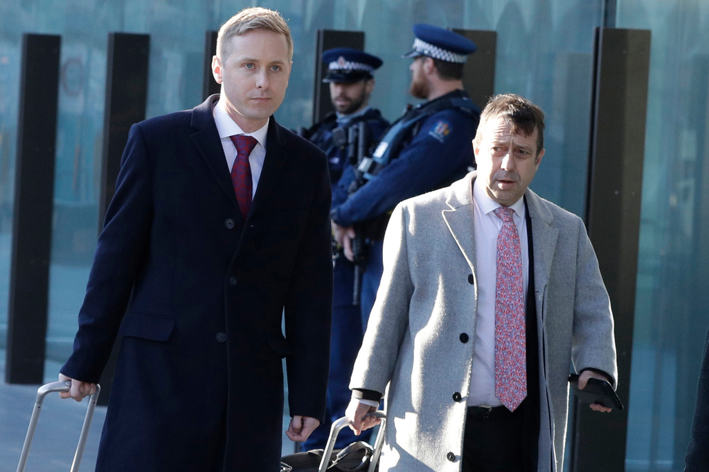 FILE - Jonathan Hudson, left, and Shane Tait, then defense lawyers for Brenton Tarrant, arrive at the Christchurch District Court in Christchurch, New Zealand, Aug. 15, 2019. (AP Photo/Mark Baker, File)