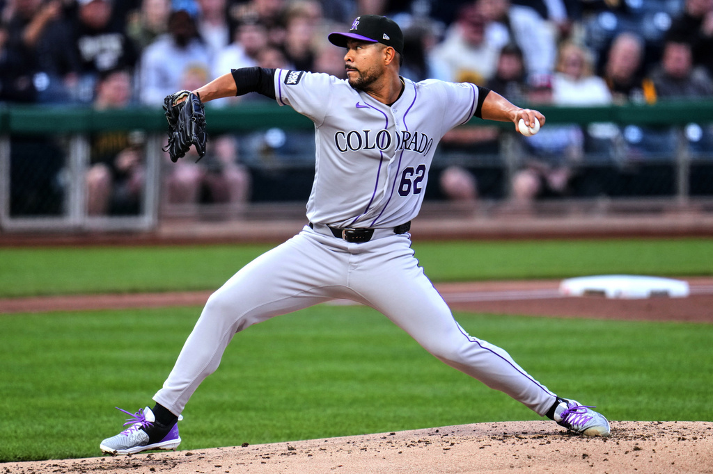 Colorado Rockies pitcher Jose Quintana delivers during the first inning of a baseball game against the Pittsburgh Pirates in Pittsburgh, Wednesday, May 13, 2026. (AP Photo/Gene J. Puskar)
