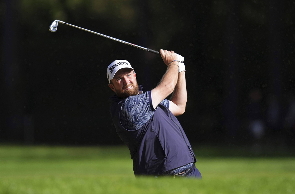 Ireland's Shane Lowry plays from a bunker on the 6th during day one of the 2025 BMW PGA Championship at Wentworth Golf Club in Virginia Water, Surrey, England, Thursday, Sept. 11, 2025. (Adam Davy/PA via AP)