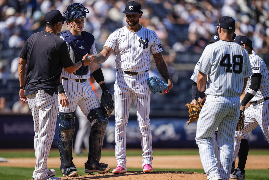 New York Yankees pitcher Luis Gil walks off the mound during the sixth inning of a baseball game against the Houston Astros, Saturday, Aug. 9, 2025, in New York. (AP Photo/Yuki Iwamura)