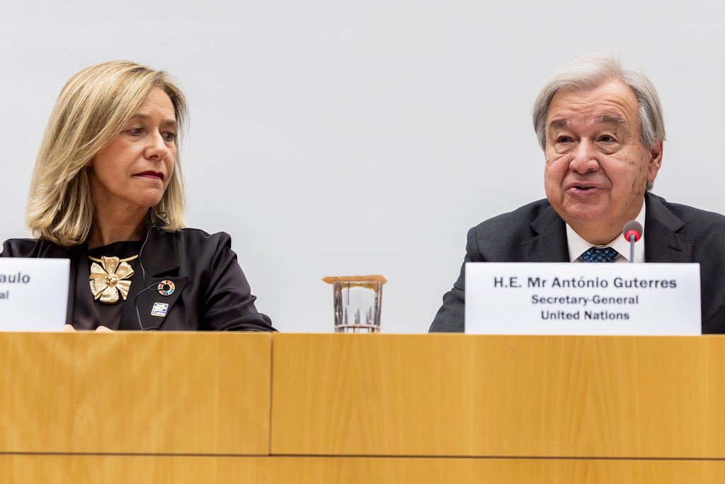U.N. Secretary-General Antonio Guterres, right, sitting next to Celeste Saulo, left, Secretary-General of World Meteorological Organization (WMO), delivers his speech during the World Meteorological Organization Extraordinary Congress at the headquarters of the World Meteorological Organization (WMO), in Geneva, Switzerland, Wednesday, Oct. 22, 2025. (Salvatore Di Nolfi/Keystone via AP)