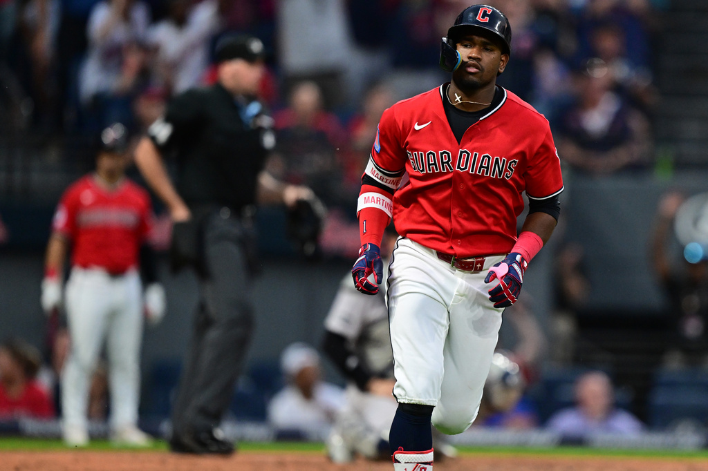 Cleveland Guardians' Angel Martinez runs the bases after hitting a two-run home run off New York Yankees relief pitcher Brent Headrick during the sixth inning of a baseball game, Monday, June 8, 2026, in Cleveland. (AP Photo/David Dermer)