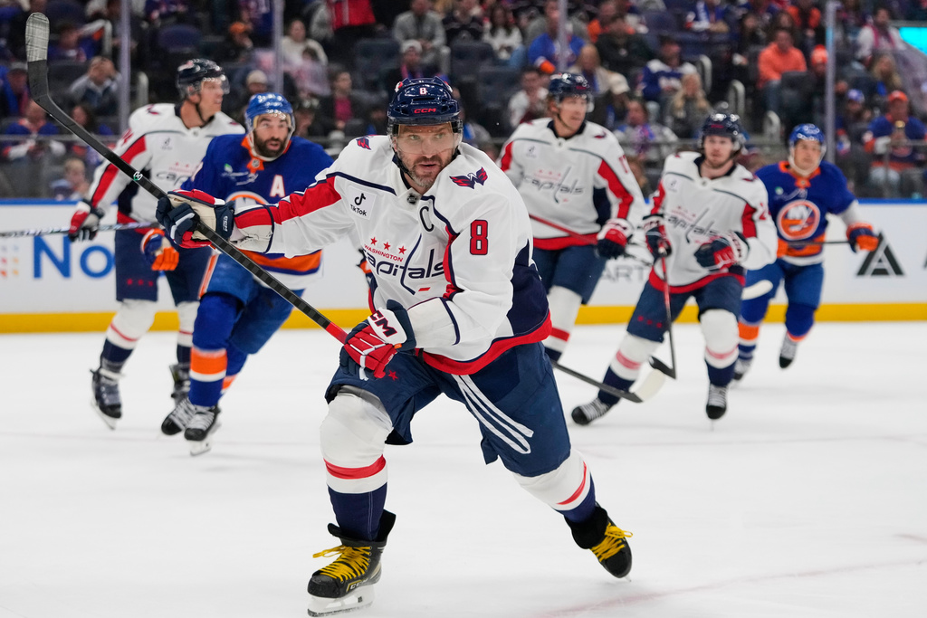 Washington Capitals' Alex Ovechkin (8) skates during the second period of an NHL hockey game against the New York Islanders Saturday, Oct. 11, 2025, in Elmont, N.Y. (AP Photo/Frank Franklin II)