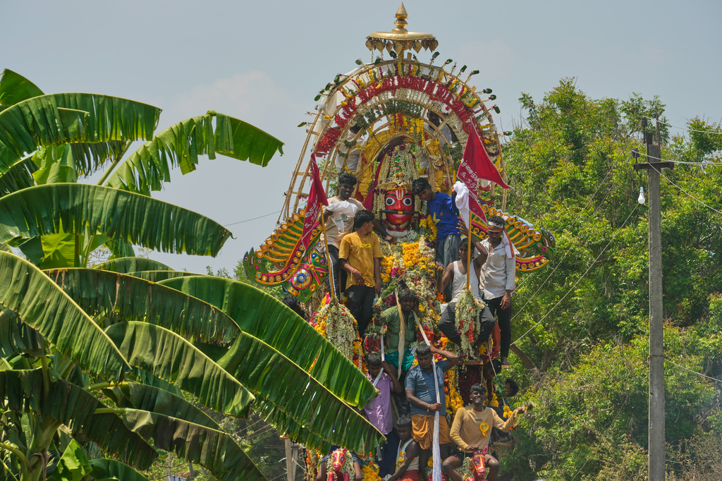 A chariot procession of the Hindu god Aravan is taken out during the Koovagam transgender festival in Kallakurichi district of the southern Indian state of Tamil Nadu, Wednesday, April 29, 2026. (AP Photo/Mahesh Kumar A.)