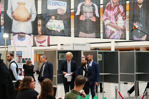 Far-right anti Islam lawmaker Geert Wilders, center, prepares to cast his vote at a polling station during general elections in The Hague, Netherlands, Wednesday, Oct. 29, 2025. (AP Photo/Peter Dejong) Far-right anti Islam lawmaker Geert Wilders, center, prepares to cast his vote at a polling station during general elections in The Hague, Netherlands, Wednesday, Oct. 29, 2025. (AP Photo/Peter Dejong)
