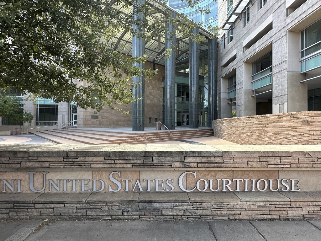 The Evo A. DeConcini U.S. Courthouse in Tucson, Arizona, is seen, Thursday Sept. 11, 2025, where a judge extended a temporary restraining order blocking the Trump administration's effort to remove Guatemalan and Honduran children living in shelters or foster care after coming to the U.S. alone. (AP Photo/Jacques Billeaud)