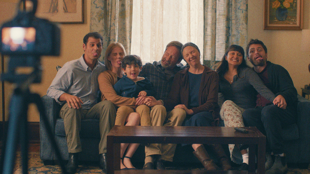 Skyler Bible,from left, Lucy Boynton, Oliver Diego Silva, David Duchovny, Hope Davis, Ariela Barer and Cooper Raiff appear in a scene from "See You When I See You" by Jay Duplass, an official selection of the 2026 Sundance Film Festival. (Jim Frohna/Sundance Institute via AP)
