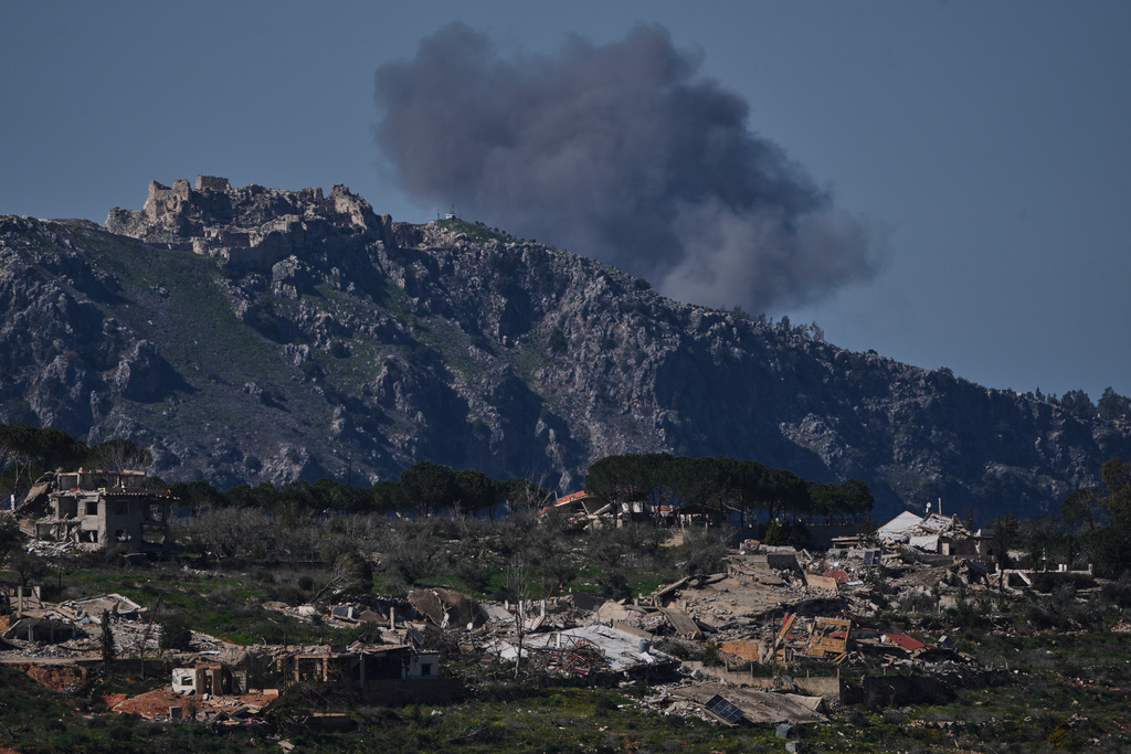 Smoke rises following Israeli bombardment in southern Lebanon as seen from northern Israel, Thursday, March 5, 2026. (AP Photo/Ariel Schalit)