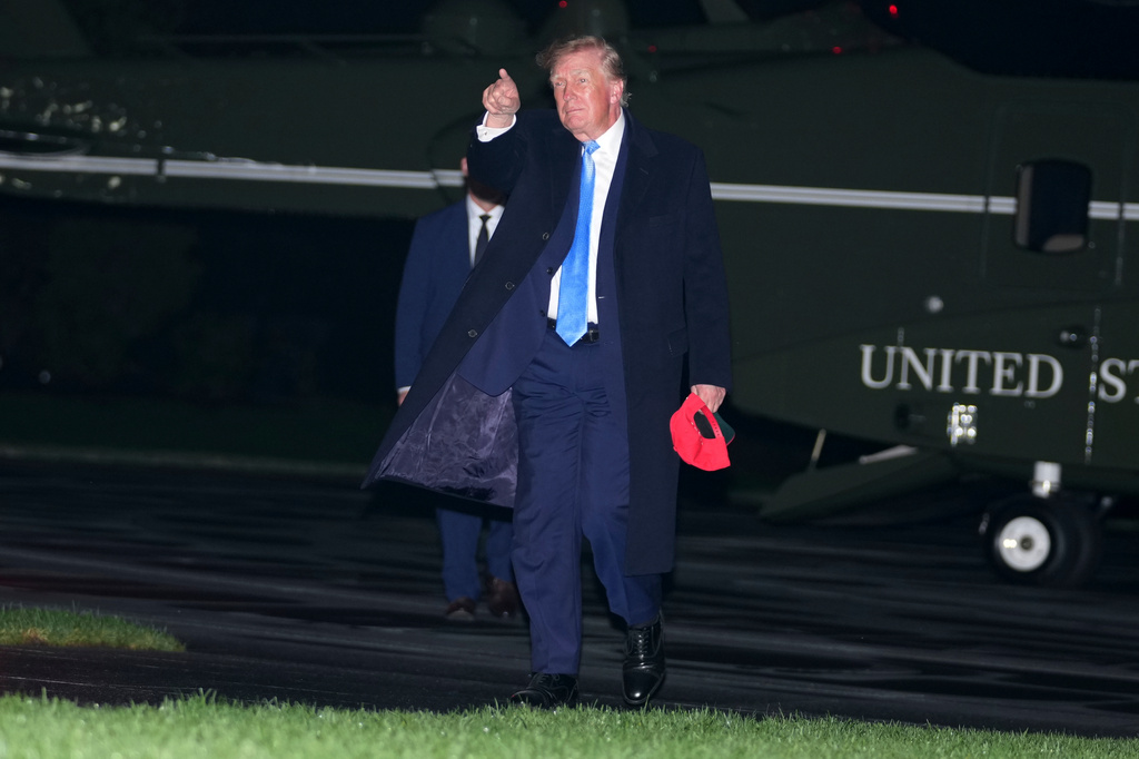 President Donald Trump walks on the South Lawn of the White House after arriving on Marine One, Sunday, Sept. 27, 2026, in Washington. (AP Photo/Allison Robbert)
