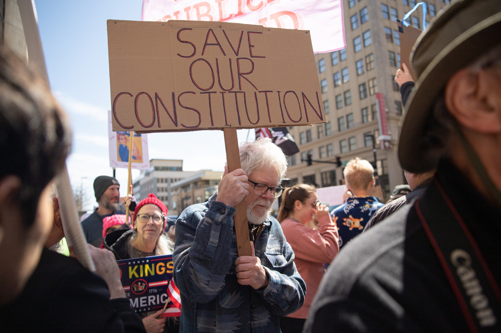 Demonstrators participate in a "No Kings" protest in Wichita, Kan., on Saturday, March 28, 2026. (Zachary Ruth/The Sunflower via AP)