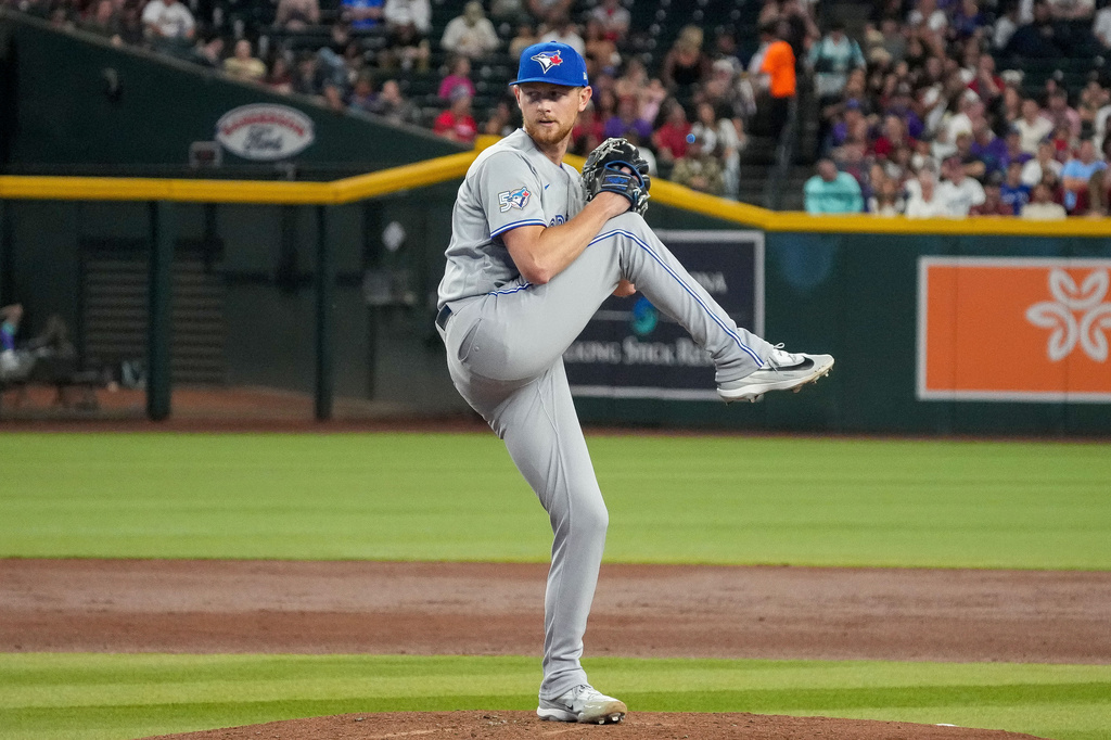 Toronto Blue Jays pitcher Eric Lauer works against the Arizona Diamondbacks during the third inning of an baseball game Friday, April 17, 2026, in Phoenix. (AP Photo/Darryl Webb)