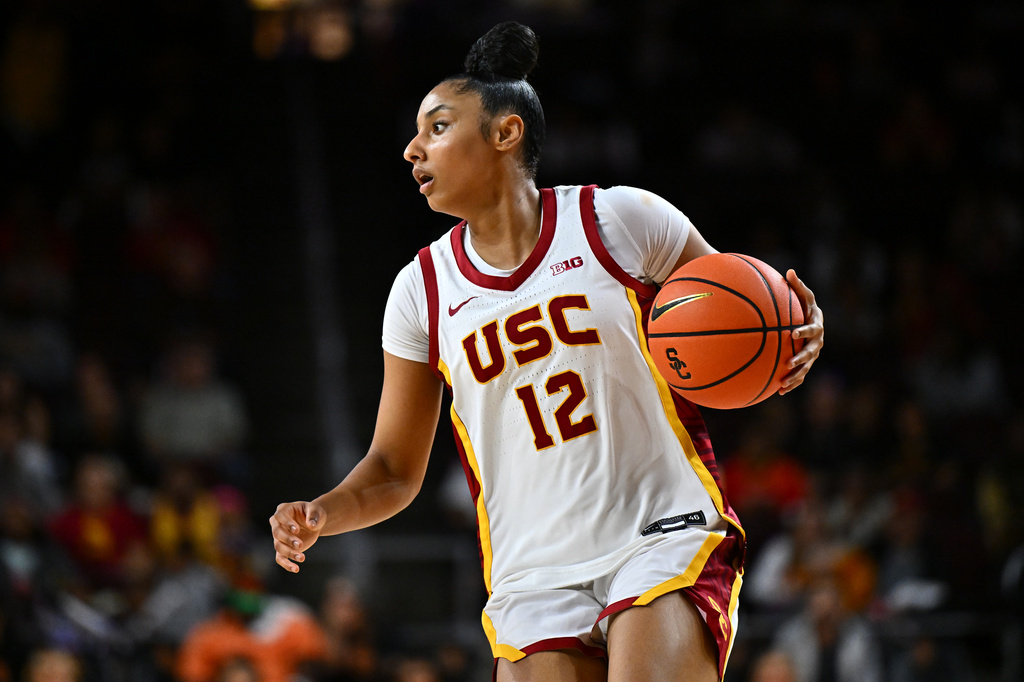 Southern California guard Juju Watkins dribbles during the first half of an NCAA college basketball exhibition game against California, Sunday, Oct. 25, 2026, in Los Angeles. (AP Photo/William Liang)