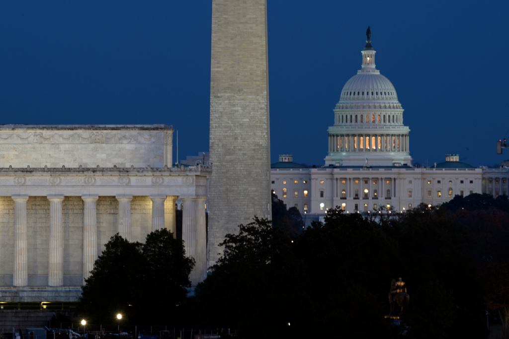 The Lincoln Memorial, Washington Monument and the U.S. Capitol in Washington, Tuesday, Nov. 4, 2025. (AP Photo/John McDonnell)