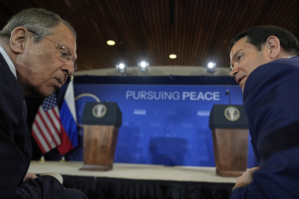 Russia's Foreign Minister Sergey Lavrov and Secretary of State Marco Rubio talks before a news conference with President Donald Trump and Russia's President Vladimir Putin at Joint Base Elmendorf-Richardson, Alaska, Friday, Aug. 15, 2025. (AP Photo/Julia Demaree Nikhinson)