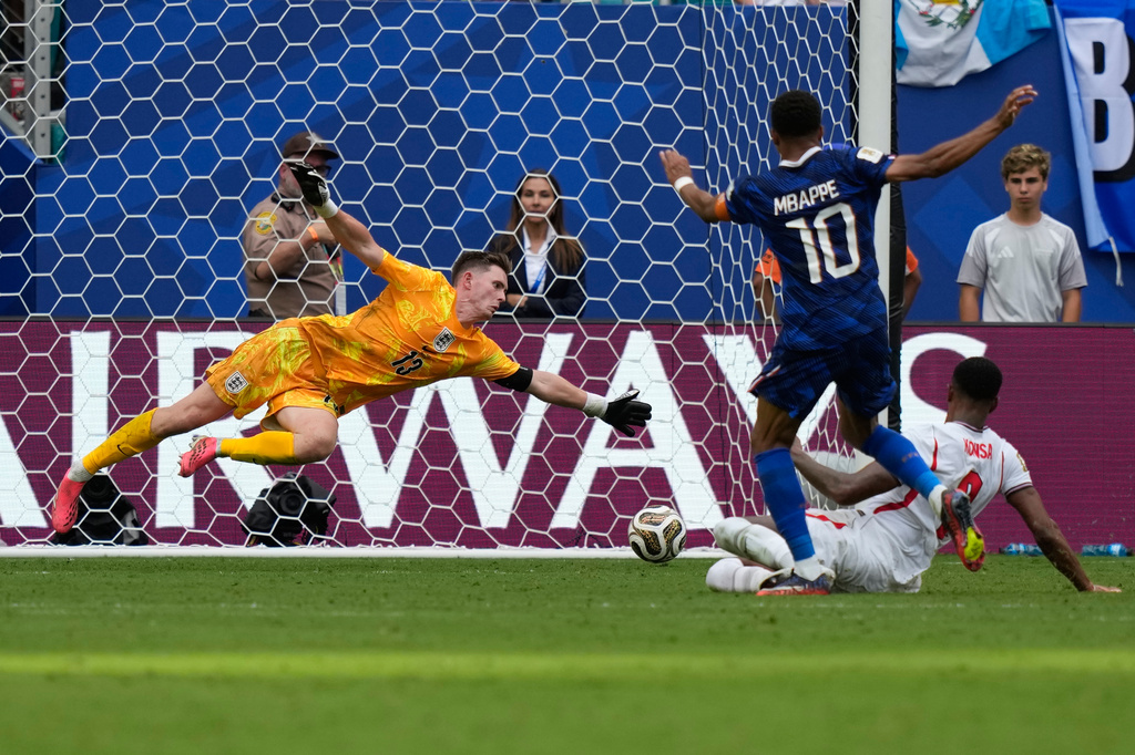 France's Kylian Mbappe (10) scores his side's 3rd goal during the World Cup third-place playoff soccer match between France and England in Miami Gardens, Fla., Saturday, July 18, 2026. (AP Photo/Lynne Sladky)